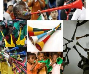 пазл Vuvuzela, это какие-то длинные трубы, используемые болельщиков поболеть за свои команды, особенностью южноафриканского футбола.